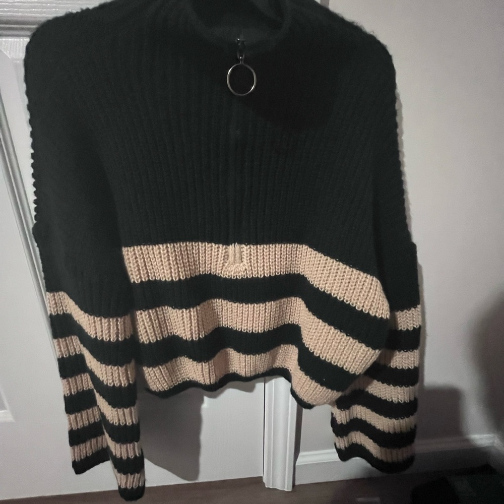 Elegant Black and Cream Striped Women's Turtleneck Sweater